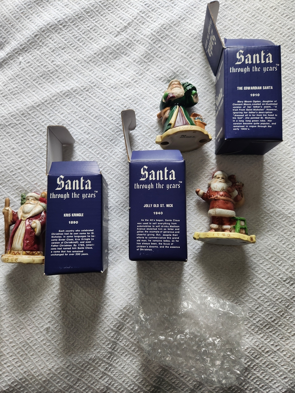 Santa Through the Years Porcelain Figurine Set - Multicolor